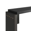 Console table with graphite leather-wrapped legs supporting staggered slab top of ebony oak 