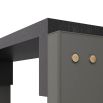 Console table with graphite leather-wrapped legs supporting staggered slab top of ebony oak 