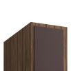 Curved wooden cabinet with ribbed, bronze-finish hardware