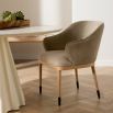 Dining or armchair in taupe suede finish and textured wooden legs