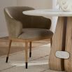 Dining or armchair in taupe suede finish and textured wooden legs