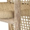 Wicker-style bar stool with cape effect back piece