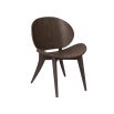 Brown wooden chair with sweeping silhouette 