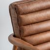 Leather armchair with deep ridging and wooden frame