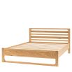 Stylish wooden double bed with exposed corners