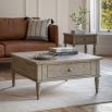 Lightly brushed coffee table crafted from Mindy wood with a stunning inlaid parquet-style design