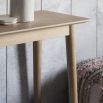 Warm wooden console table with chevron design