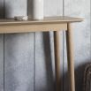 Warm wooden console table with chevron design