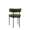 Round seat chair with slim legs and curved back