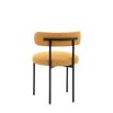 Round seat chair with slim legs and curved back