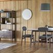 Dining table in walnut stained wood with marble top