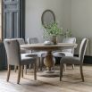 Rustic and sophisticated dining table with detailed base