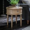 Round wooden side table