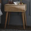 Warm wooden side table with chevron design