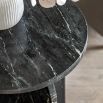 Marble top side table with curved base