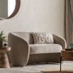 Curved sofa with smooth cream finish