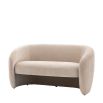 Curved sofa with smooth cream finish