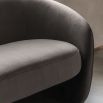 Curved sofa with smooth brown finish