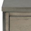 Sleek and simple grey wood side table with stone top and cross nickel legs