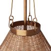 Natural rattan shade accented with vertically aligned brass structures