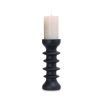 Black resin candle holder featuring four decorative spheres