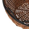 Basket-shaped centrepiece crafted from handmade natural and black rattan vessels