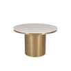 Round dining table with beautiful brushed brass finish and clean white marble top