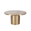 Round dining table with beautiful brushed brass finish and clean white marble