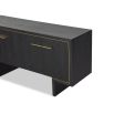 Sleek black sideboard with brass handles and frame