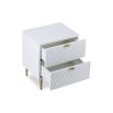 Elegant white bedside with two drawers and hexagonal pattern inlay with brass accents