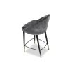 Round silhouette grey velvet counter stool with buttoning details