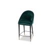 Classic round silhouette counter stool in deep green velvet