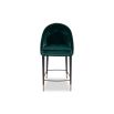 Classic round silhouette counter stool in deep green velvet