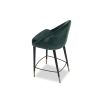 Classic round silhouette counter stool in deep green velvet