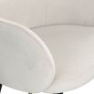 low back wrap around dining chair in white velvet with black legs and brass capped feet