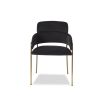 Black velvet upholstered dining chair with brass legs and wraparound backrest and arms