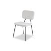 Elegant minimalist dining chair with black frame and boucle upholstered seat and back rest