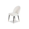 Rounded back dining chair with black legs, brass feet caps and boucle upholstered