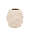 Small ceramic vase which evokes natural forms of nature