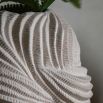 Large ceramic vase which evokes natural forms of nature