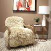 The Baaarb Accent Chair, featuring real cream sheepskin and a solid oak frame, adds Scandi-inspired charm and luxury to any room.