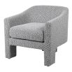 Soft grey arm chair with three legs and low back