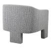 Soft grey arm chair with three legs and low back