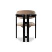 Smooth taupe upholstered chair with three black leg design