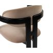 Smooth taupe upholstered chair with three black leg design