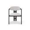 dining chair with Boucle upholstered backrest and seat and black legs and arm rests