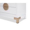 White chest of drawers with circular brass handles and legs