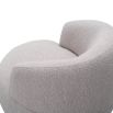 Small and circular boucle taupe swivel chair with rounded edges and brass base