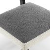 Boucle sand and grey dining chair with dark wood legs