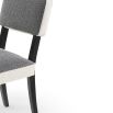 Boucle sand and grey dining chair with dark wood legs